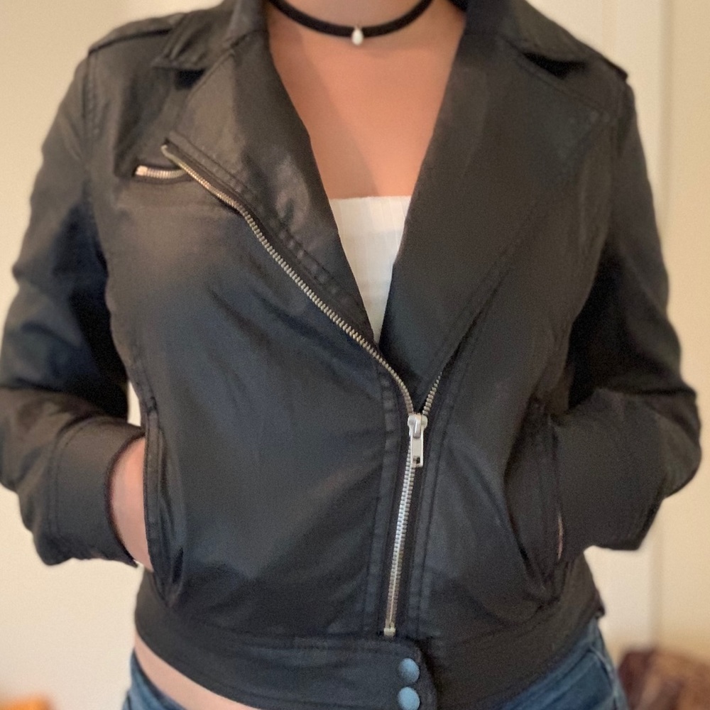 Black jacket with minor wear on elbow area